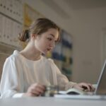 Woman going over her QuickBooks Online setup mistakes