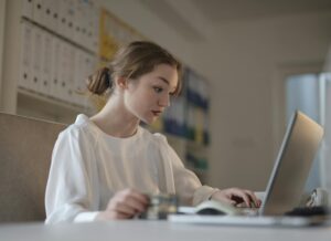 Home 15 Woman going over her QuickBooks Online setup mistakes