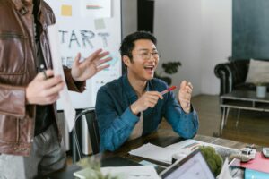 Home 10 Man smiling about tech startup accounting